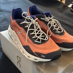 On Running Orange and Blue Athletic Shoes with Chunky Sole